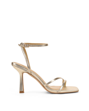 Women's high heel stiletto sandal in gold metallic leather