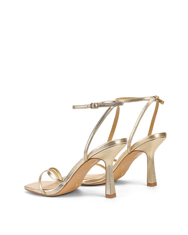 Women's high heel stiletto sandal in gold metallic leather