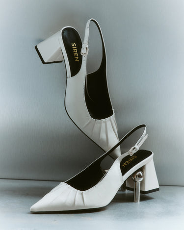 Women's white leather slingback block heel with ruched detailing and buckle fastening