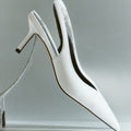 Women's slingback kitten heel in white croc leather with pointed toe and v shaped throat and elastic fastening